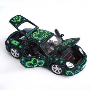 Porsche Cayman S customized with Huichol art – a collector's item in shades of green