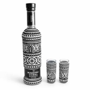 Botella intervenida con arte huichol