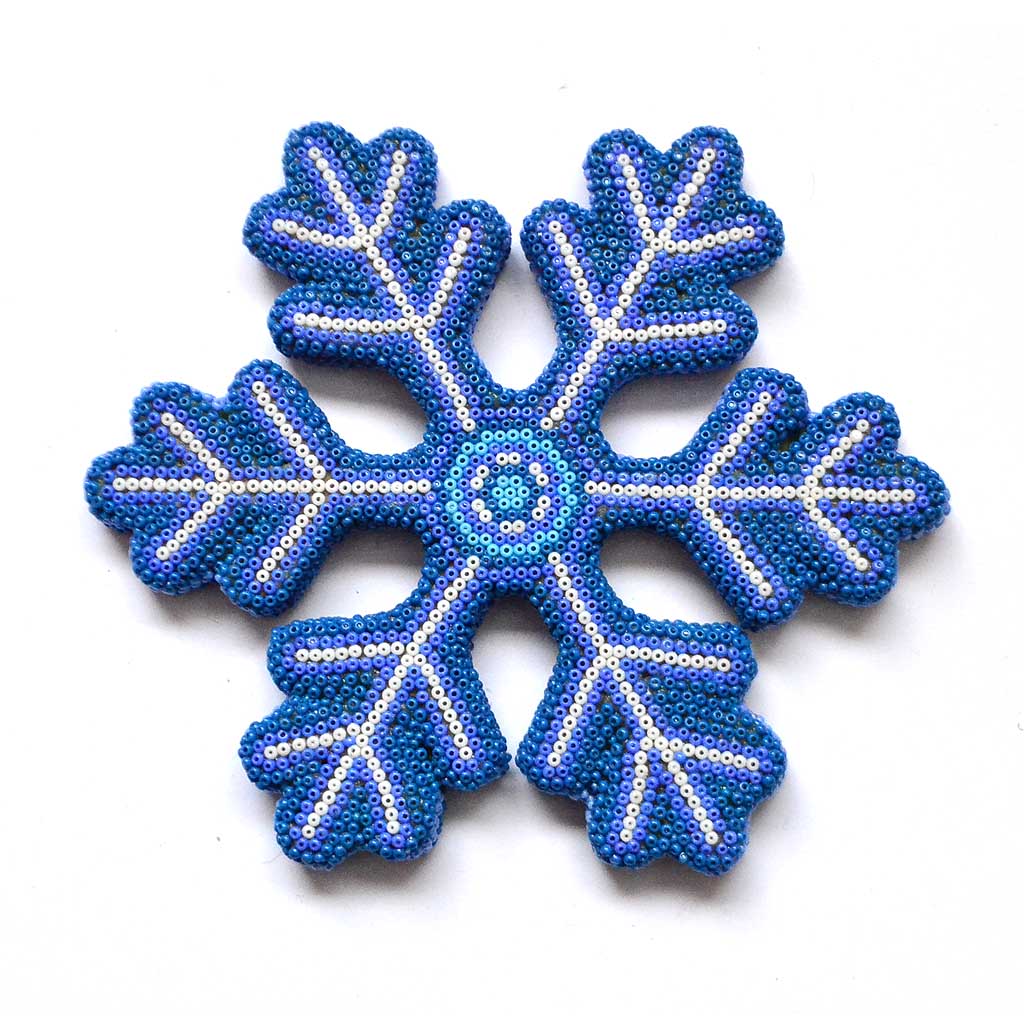 Copo de nieve con arte huichol