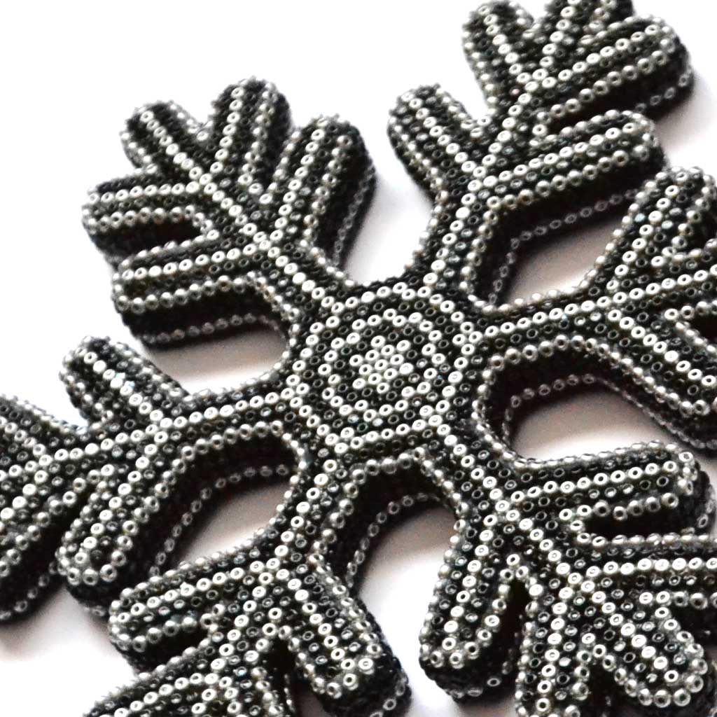 Copo de nieve con arte huichol
