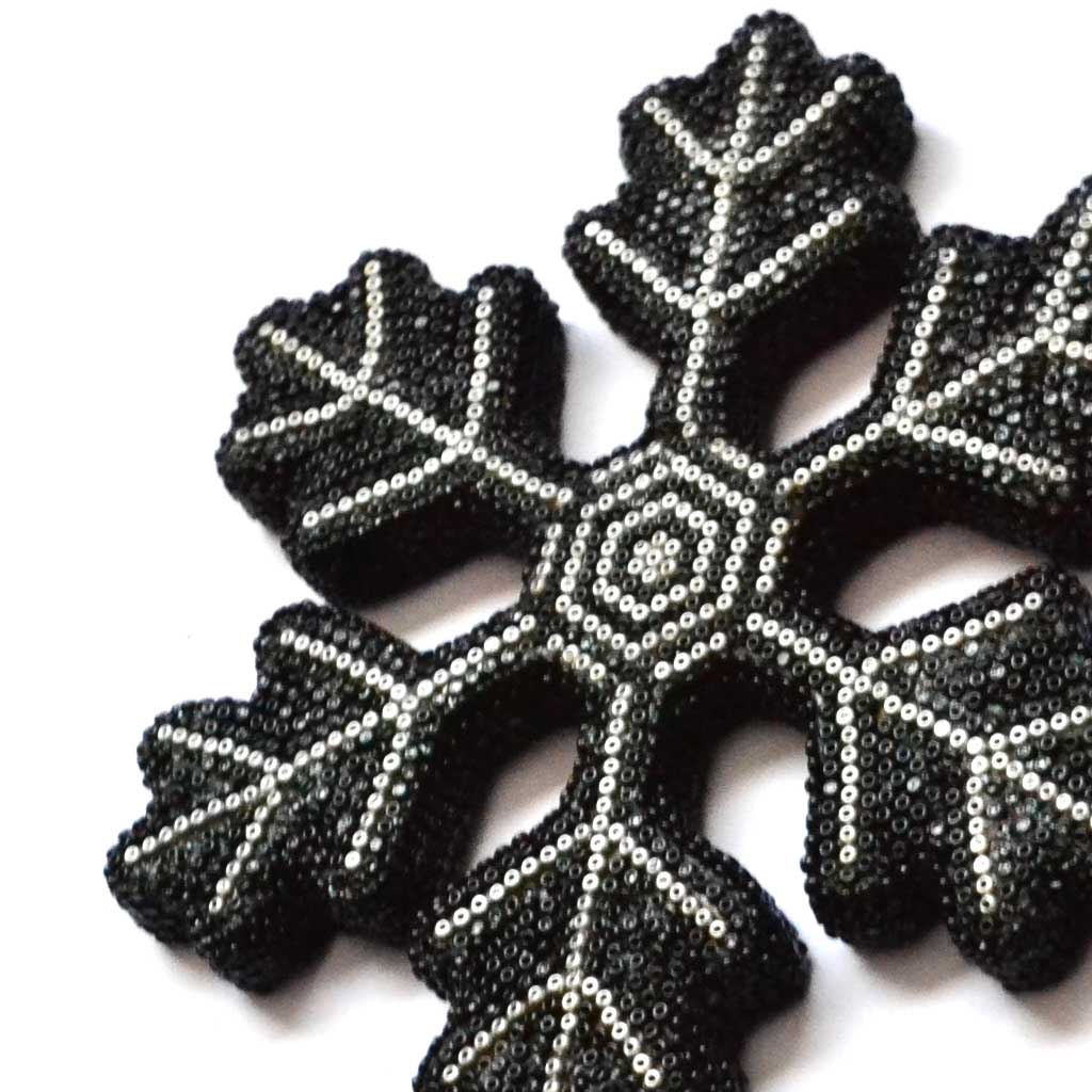 Copo de nieve con arte huichol